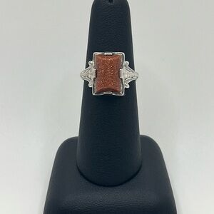 Elegant Silver and Goldstone Ring